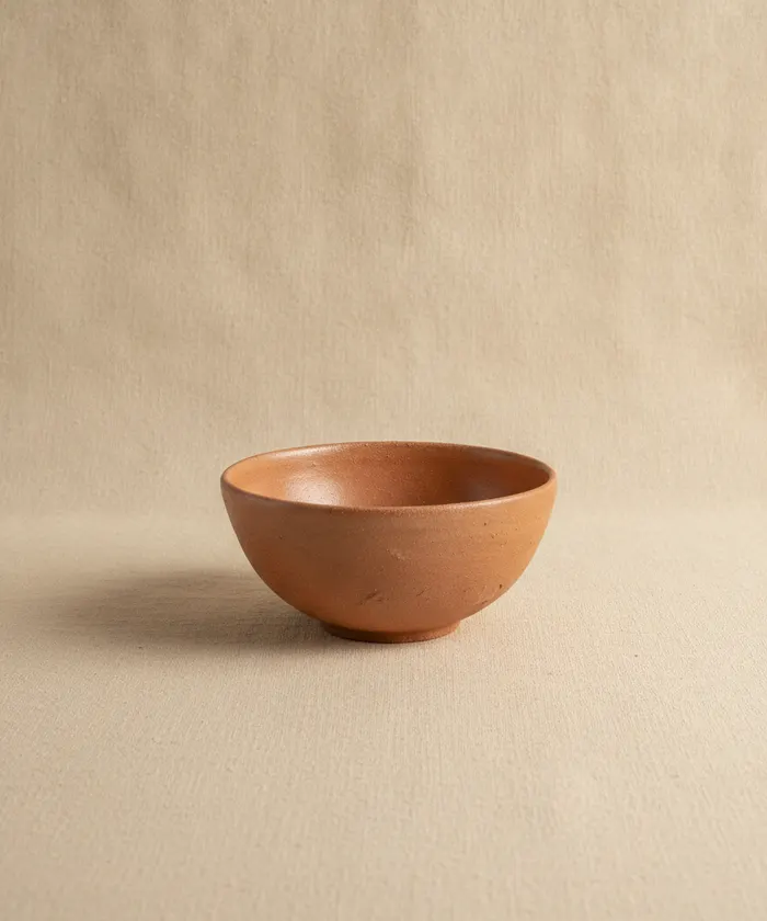 A fired terracotta bowl